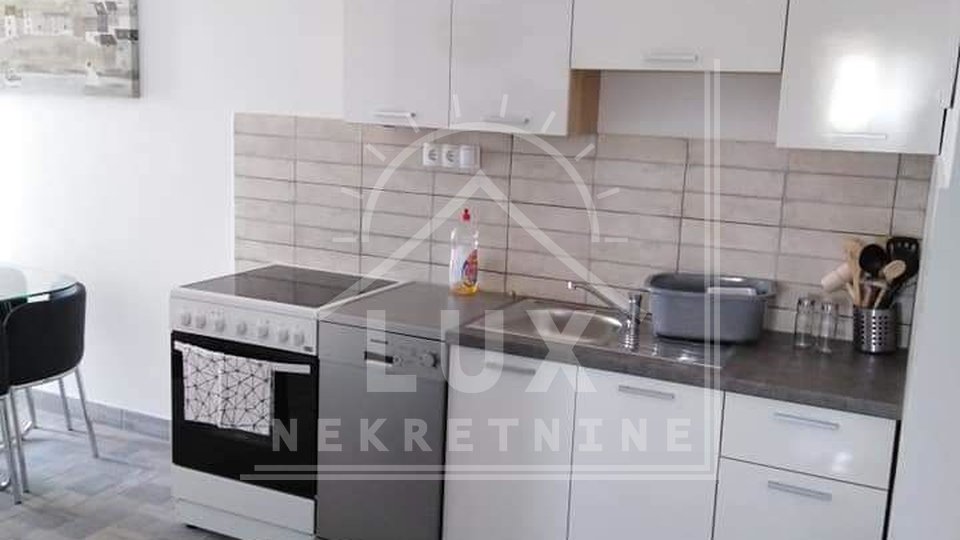 Two apartments in a house, Posedarje, not far from Zadar, with a view of the sea