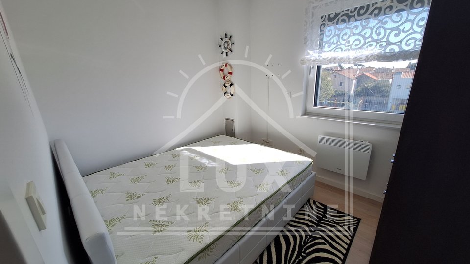 Two-room apartment with garage and garden, Zadar (Diklo), 50 m from the sea