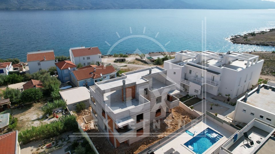 Two-bedroom apartment with garden in NEW BUILDING, Ražanac, 60 meters from the sea